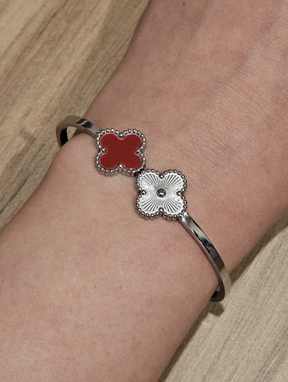 Silver Hinged Bangle Bracelet with Red and Silver Clover Motifs